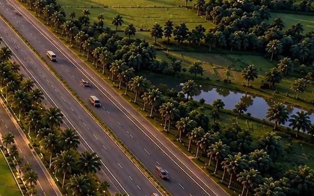 The NH-9 highway running past the project